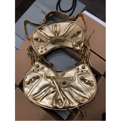 Dámská střední kabelka Balenciaga Le Cagole ve zlaté barvě 27541