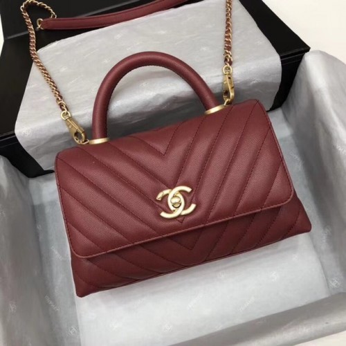 Chanel malá klopová kabelka s horním uchem A92990 vínová