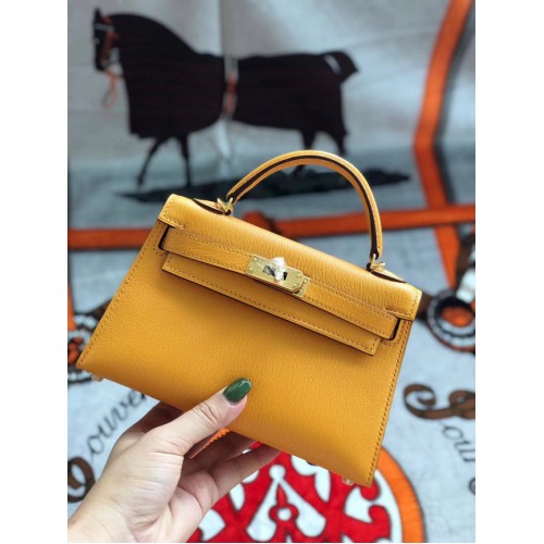 Hermes originální mini Kelly chevre mysore K19CM mango žlutá a zlatá kovová