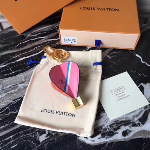 Přívěsek a držák na klíče Louis Vuitton V airbagu M67392 růžový