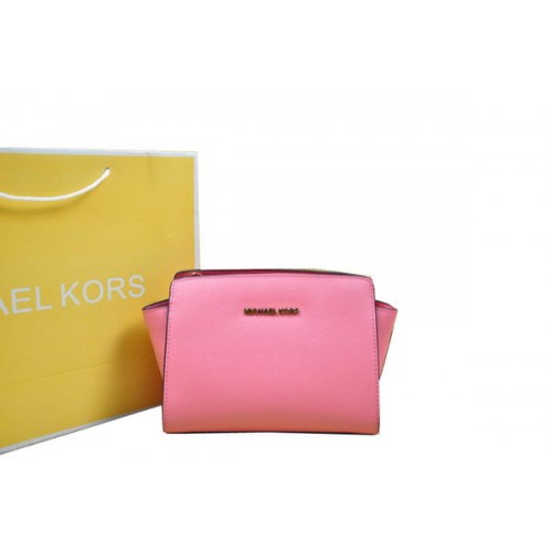 Kabelka Michael Kors Mini Selma přes rameno růžová