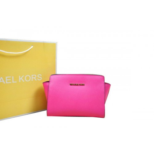Kabelka Michael Kors Mini Selma přes rameno růžová