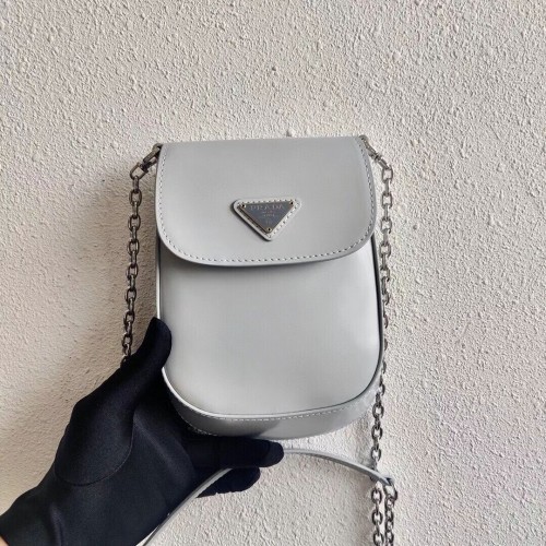 Prada mini kabelka z kartáčované kůže 1BH185 světle šedá